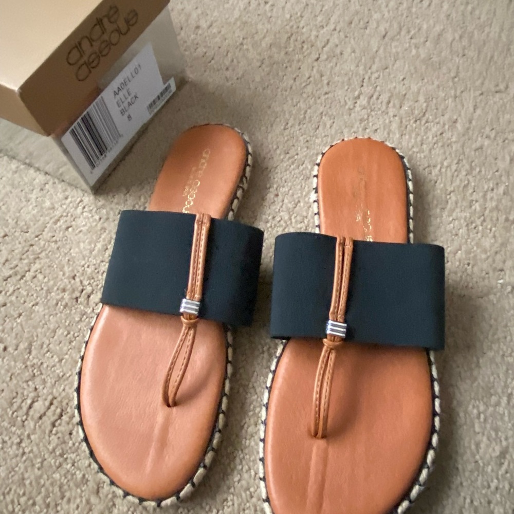 Andre Assous sandals. Size 8. Black with fiber trim. Perfect casual wear. New!